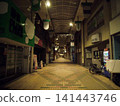 A deserted shopping arcade at night 141443746