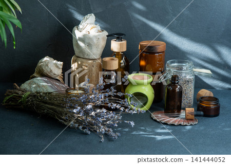 Scent candles and jars with essential oil. Dried lavender. Aromatherapy Scent candles and jars with essential oil. Dried lavender. Aromatherapy 141444052