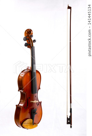 Violin and bow on a white background Violin and bow on a white background 141445134