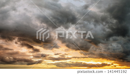Evening sunset sky with colorful clouds. Panoramic skyscape Evening sunset sky with colorful clouds. Panoramic skyscape 141445192