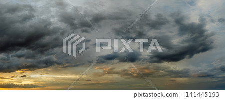 Evening sunset sky with colorful clouds. Panoramic skyscape Evening sunset sky with colorful clouds. Panoramic skyscape 141445193