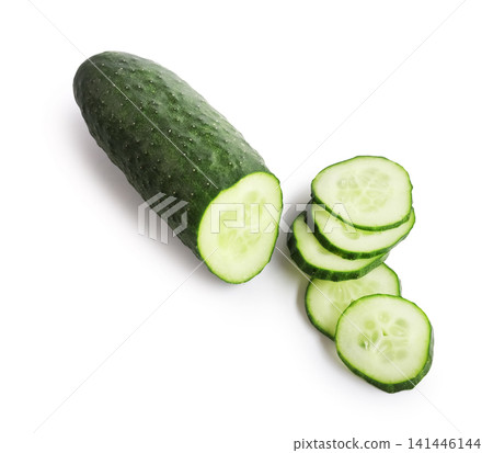 Fresh green raw cucumber and slices isolated on a white background. Healthy vegetable food concept for a vegetarian diet. Fresh green raw cucumber and slices isolated on a white background. Healthy vegetable food concept for a vegetarian diet. 141446144