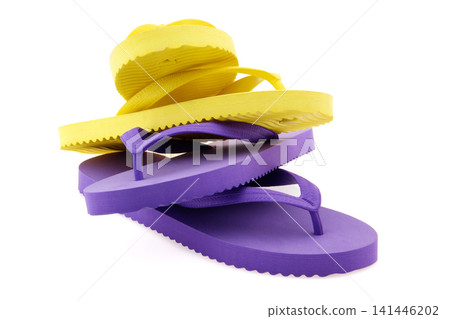two pairs of flipflops on white two pairs of flipflops on white 141446202