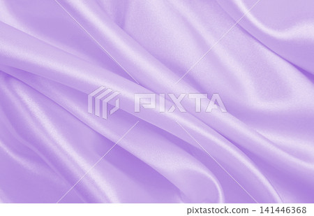 Smooth elegant lilac silk or satin texture as wedding background. Luxurious background design Smooth elegant lilac silk or satin texture as wedding background. Luxurious background design 141446368