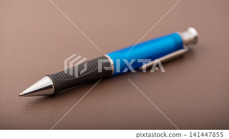 Pen, beautiful pen with detailed brown synthetic leather surface, selective focus. Pen, beautiful pen with detailed brown synthetic leather surface, selective focus. 141447855