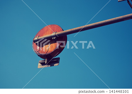 Behind the traffic sign Behind the traffic sign 141448101