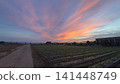 Crimson sunset clouds 141448749