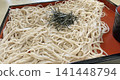 Handmade soba noodles served in a bamboo steamer 141448794