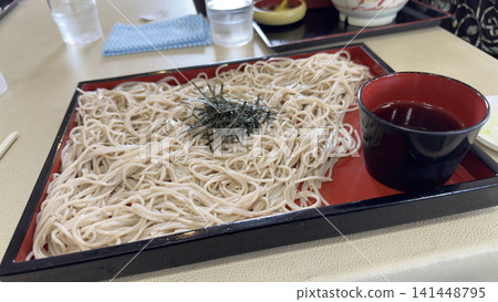 Handmade soba noodles served in a bamboo steamer 141448795