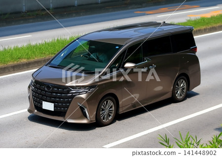 Luxury minivan in motion Luxury minivan in motion 141448902