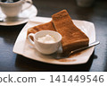 Cinnamon toast eaten at a coffee shop 141449546