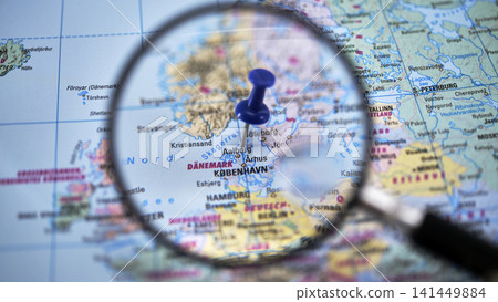 AALBORG highlighted on paper map with magnifying glass AALBORG highlighted on paper map with magnifying glass 141449884
