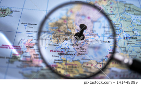 map, magnifying glass, pin 141449889