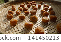 Traditional homemade white pickled plums: A scene of them being dried in the summer sun. 141450213