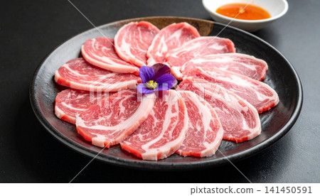 Pork slices on the plate for the shabu on top view Pork slices on the plate for the shabu on top view 141450591