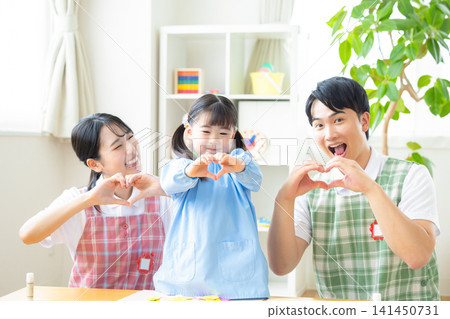 Childcare image: Portrait of a girl and a childcare worker Childcare image: Portrait of a girl and a childcare worker 141450731