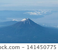 Hello from above the clouds! The miraculous view of Mount Fuji from the airplane window. 141450775