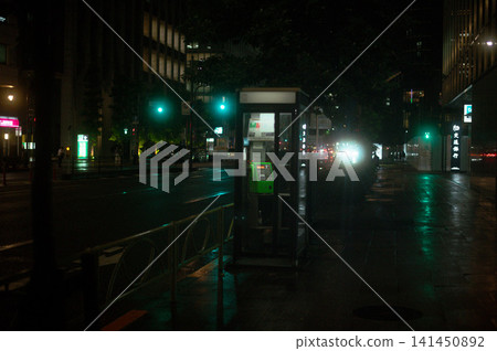 A telephone booth that illuminates the night A telephone booth that illuminates the night 141450892