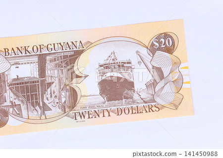 Twenty Guyanese dollar banknote as part of official currency of Guyana. Twenty Guyanese dollar banknote as part of official currency of Guyana. 141450988