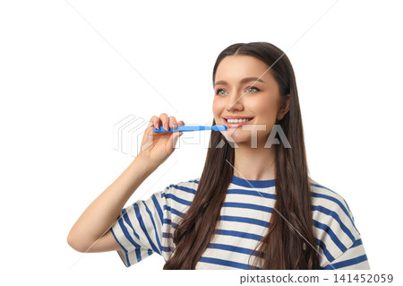 Young woman smiles while brushing her teeth, on white, PNG Young woman smiles while brushing her teeth, on white, PNG 141452059