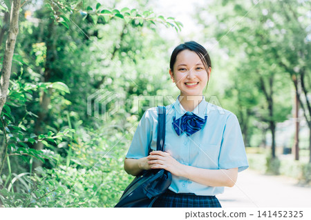 School girls going to school School girls going to school 141452325