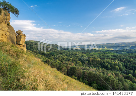 The Human Rock in Kislovodsk. Tourist attraction, Rock Man on the mountain Small saddle. Kislovodsk, North Caucasus, Russia The Human Rock in Kislovodsk. Tourist attraction, Rock Man on the mountain Small saddle. Kislovodsk, North Caucasus, Russia 141453177