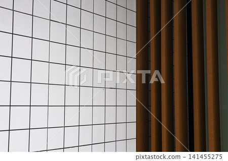 Modern Grid Tiled Wall With Vertical Wooden Slats Modern Grid Tiled Wall With Vertical Wooden Slats 141455275
