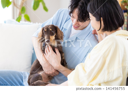 Family Life with a Dog: Portraits of a Couple and Their Beloved Dog Family Life with a Dog: Portraits of a Couple and Their Beloved Dog 141456755