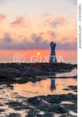 Sado Island's Nagate Cape Lighthouse and sunset in early summer, Sado City, Niigata Prefecture. Sado Island's Nagate Cape Lighthouse and sunset in early summer, Sado City, Niigata Prefecture. 141456961