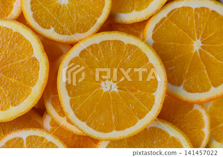 Juicy Orange Wedges Tabletop Background Juicy Orange Wedges Tabletop Background 141457022