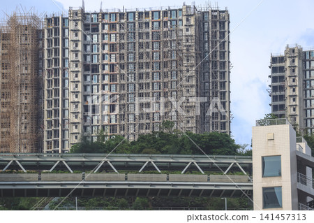 Hong Kong. July 19 2026 Highrise residential buildings under construction Hong Kong. July 19 2026 Highrise residential buildings under construction 141457313