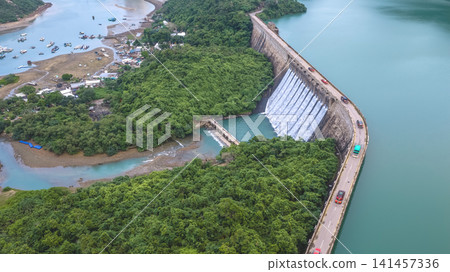 Hong Kong, July 18 2026 view of overflowing Tai Tam Dam. Hong Kong, July 18 2026 view of overflowing Tai Tam Dam. 141457336