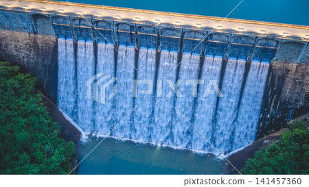 Hong Kong, July 18 2026 Evening aerial view of illuminated Tai Tam Dam. 141457360