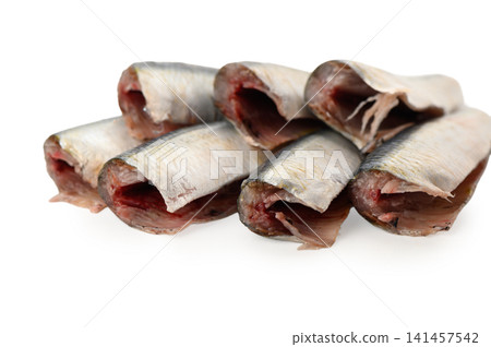 stacked fish isolated on white background with neutral top-down perspective for food photography and cooking ingredients in natural light with clean copy space. stacked fish isolated on white background with neutral top-down perspective for food photography and cooking ingredients in natural light with clean copy space. 141457542