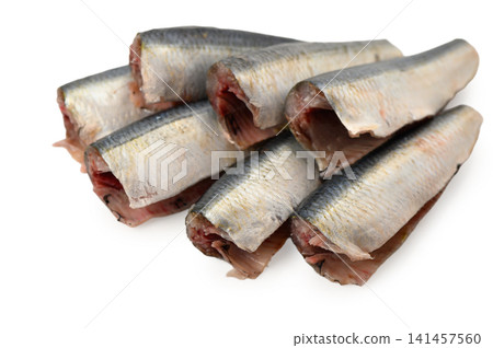 stacked fish isolated on white background with neutral mood and top-down view for culinary arts and food photography use cases in modern design and clean space. stacked fish isolated on white background with neutral mood and top-down view for culinary arts and food photography use cases in modern design and clean space. 141457560