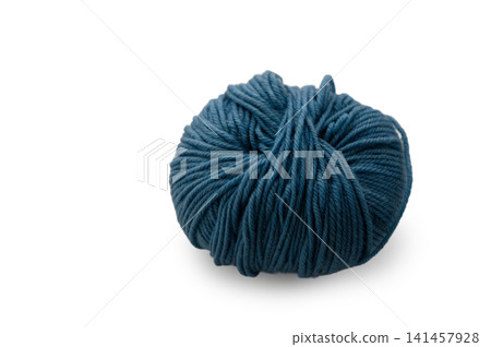 Soft teal yarn coiling elegantly on a smooth surface, ready for artistic creation and cozy projects Soft teal yarn coiling elegantly on a smooth surface, ready for artistic creation and cozy projects 141457928