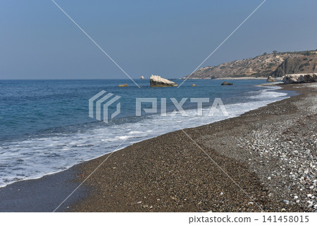 Petra tou Romiou pebble beach and coastal rock formations, Cyprus 141458015