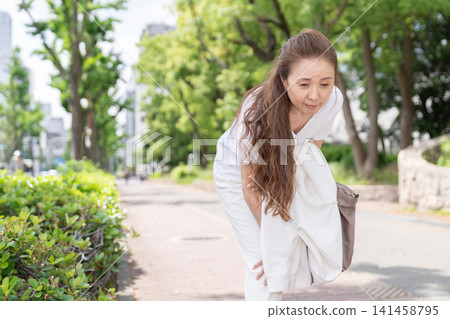 Tired senior woman Tired senior woman 141458795
