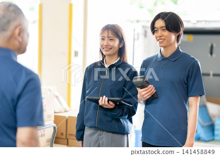 Staff members having a conversation Staff members having a conversation 141458849