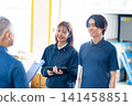 Staff members having a conversation 141458851