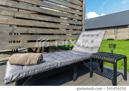 Comfortable Sun Lounger with Soft Cushion and Side Table Outdoors Comfortable Sun Lounger with Soft Cushion and Side Table Outdoors 141459250