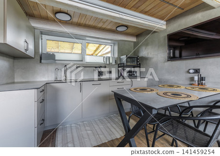 Modern Country House Kitchen and Dining Area Interior Modern Country House Kitchen and Dining Area Interior 141459254