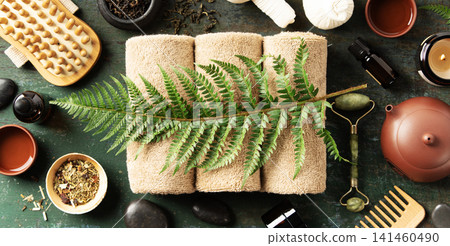 Luxury Spa Flatlay with Towels, Tea, and Natural Wellness Tools Luxury Spa Flatlay with Towels, Tea, and Natural Wellness Tools 141460490