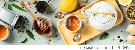 Natural Tea and Wellness Flat Lay with Herbs, Honey, and Ginger 141460492