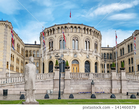 Norwegian Parliament with flags and sculptures Norwegian Parliament with flags and sculptures 141460879
