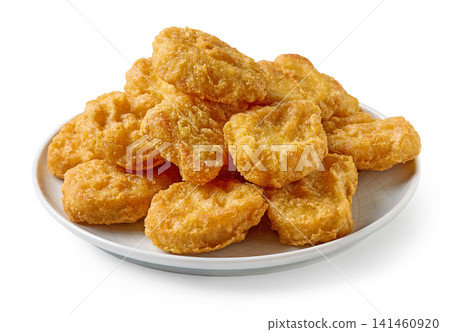 Crispy fried chicken nuggets served on plate isolated on white background Crispy fried chicken nuggets served on plate isolated on white background 141460920