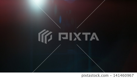 Abstract cinematic lens flare overlay with soft blue light rays, subtle optical glow and dark background. Premium VFX element for compositing, film editing, titles and motion graphics. Abstract cinematic lens flare overlay with soft blue light rays, subtle optical glow and dark background. Premium VFX element for compositing, film editing, titles and motion graphics. 141460967