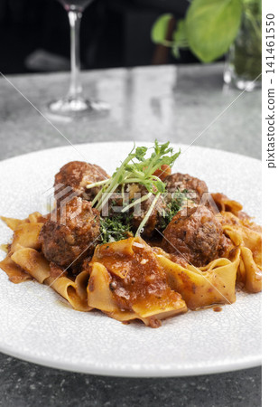 Prupetti sicilan Polpette In Sugo meatballs in ragu tomato sauce with Pappardelle pasta in Sicily restaurant 141461550
