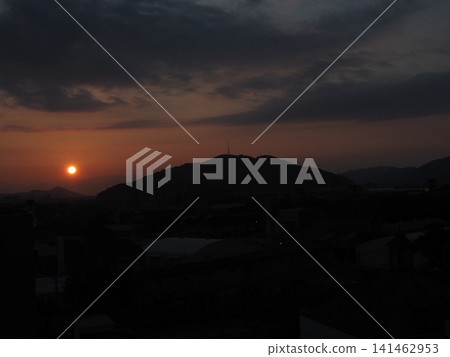 Sunrise in Kochi City (the rising sun appears above the Shikoku Mountains to the left of Mt. Godai) Sunrise in Kochi City (the rising sun appears above the Shikoku Mountains to the left of Mt. Godai) 141462953