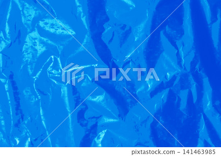 Foil crumpled texture wrinkled material abstract pattern surface background structure backdrop blue cold color Foil crumpled texture wrinkled material abstract pattern surface background structure backdrop blue cold color 141463985